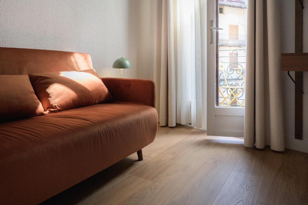 Postel nebo postele na pokoji v ubytování Hôtel Maison Doron