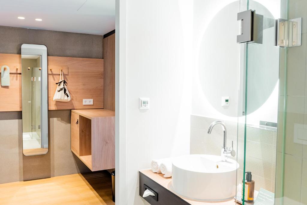 Koupelna v ubytování Coreum Hotel