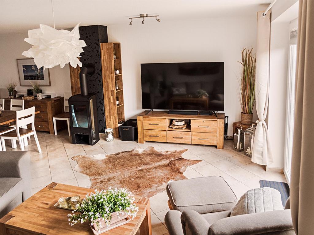 TV a/nebo společenská místnost v ubytování Unsere-Insel-Scharbeutz