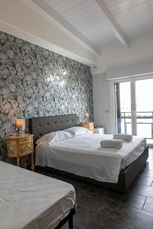 Posteľ alebo postele v izbe v ubytovaní B&B Bellavista