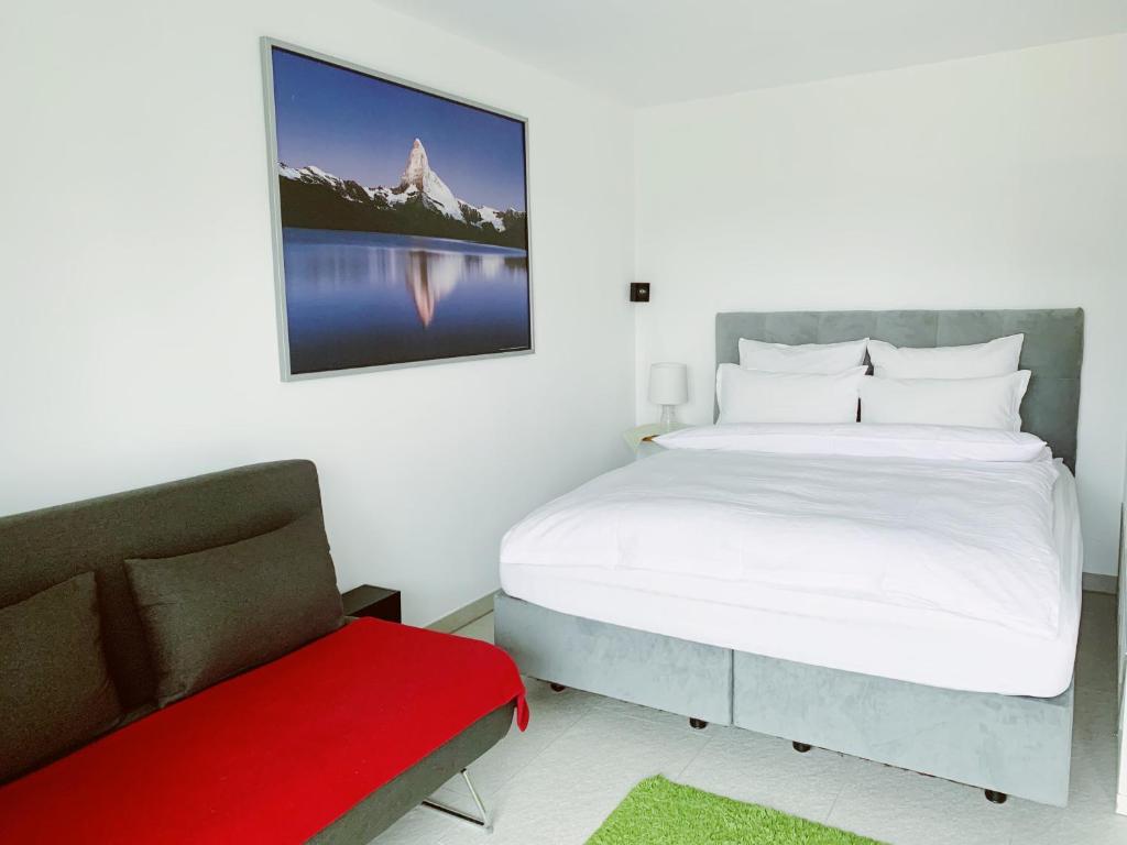 Postel nebo postele na pokoji v ubytování N1 Standalone House Baden