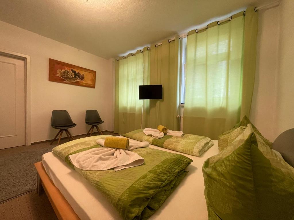 Postel nebo postele na pokoji v ubytování Landhotel Peters