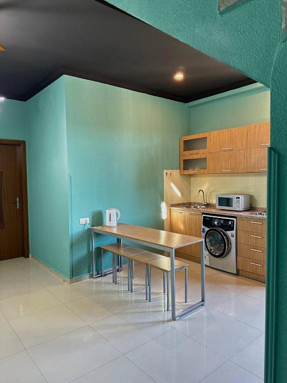 Kuchyň nebo kuchyňský kout v ubytování GS Hotel