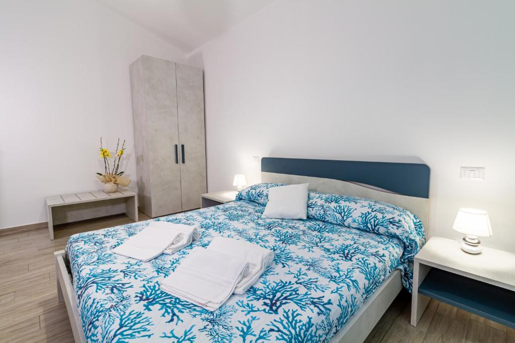 Postel nebo postele na pokoji v ubytování Agriturismo Fusini