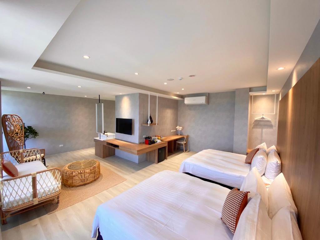 Voodi või voodid majutusasutuse Cingjing Florence Resort Villa toas