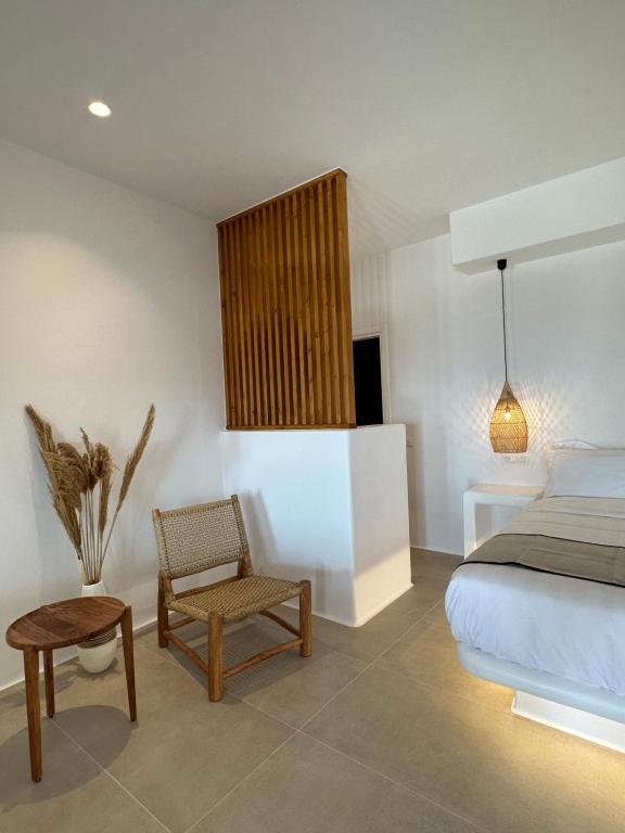 Posteľ alebo postele v izbe v ubytovaní Quattro Venti Suites Mykonos