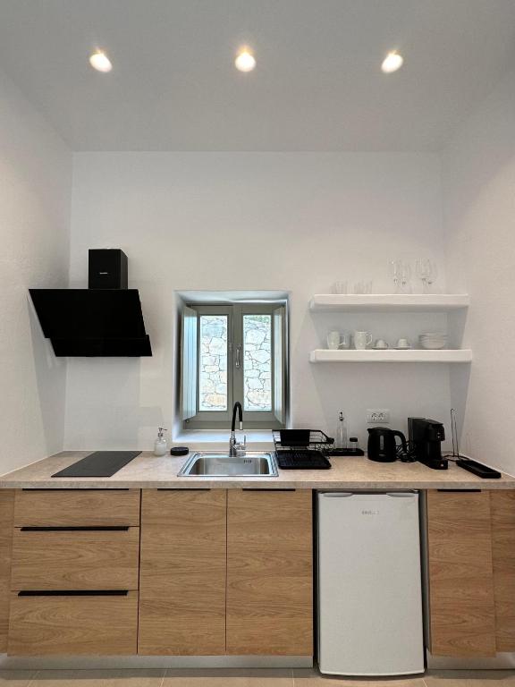 Kuchyňa alebo kuchynka v ubytovaní Quattro Venti Suites Mykonos