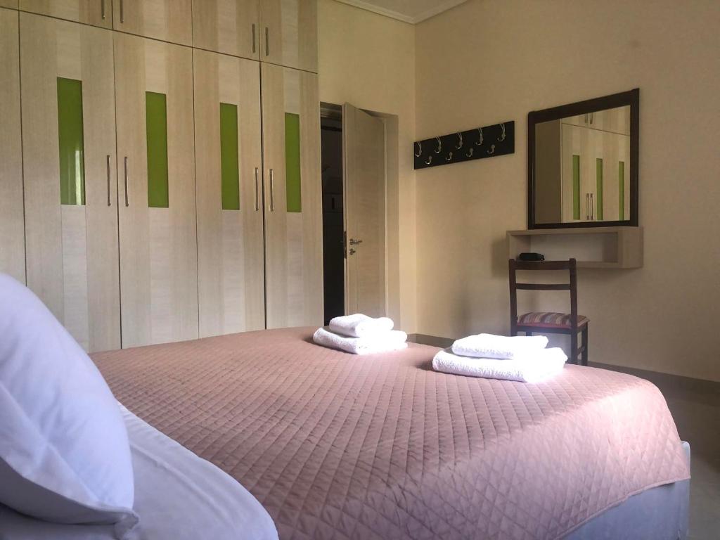 Letto o letti in una camera di Milos Apartments