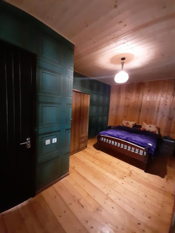 Postel nebo postele na pokoji v ubytování Guest House Gvidani