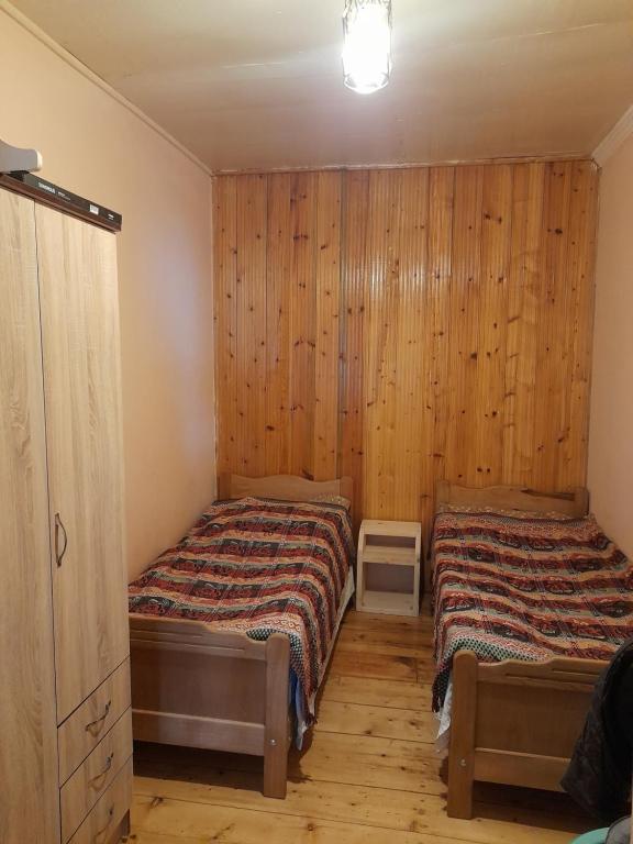 Postel nebo postele na pokoji v ubytování Guest House Gvidani