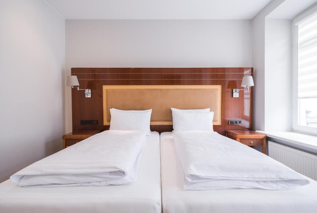 Postel nebo postele na pokoji v ubytování Lollo Residence - Lollo Luxury