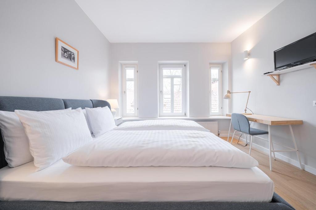 Postel nebo postele na pokoji v ubytování Lollo Residence - Lollo Luxury