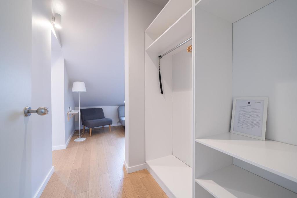Postel nebo postele na pokoji v ubytování Lollo Residence - Lollo Luxury