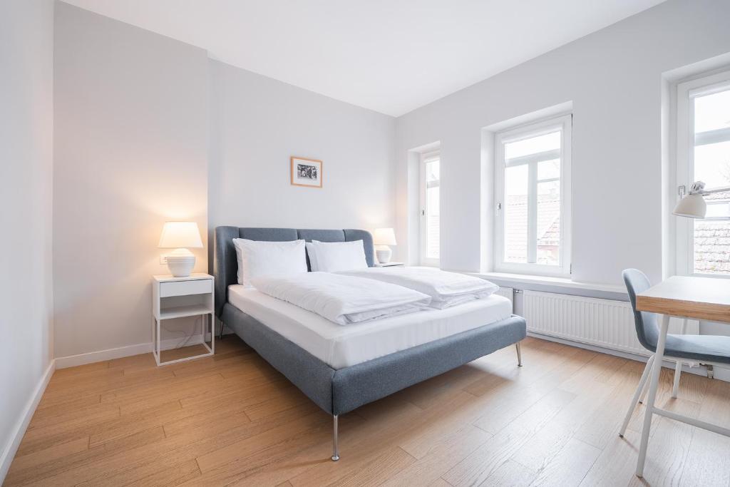 Postel nebo postele na pokoji v ubytování Lollo Residence - Lollo Luxury