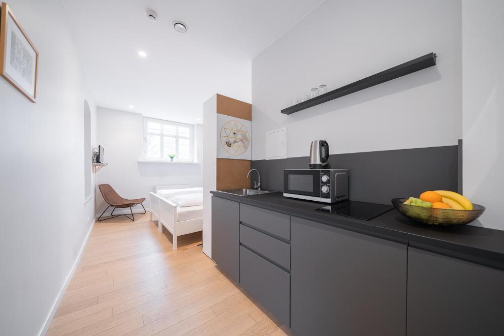 Kuchyň nebo kuchyňský kout v ubytování Lollo Residence - Lollo Luxury