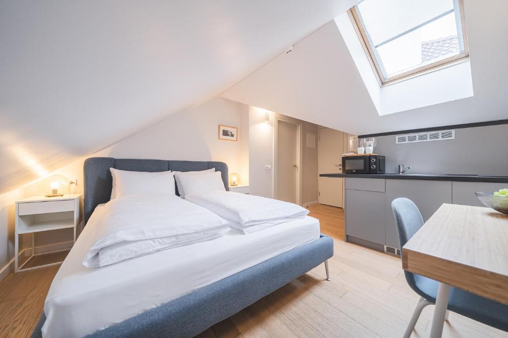 Postel nebo postele na pokoji v ubytování Lollo Residence - Lollo Luxury