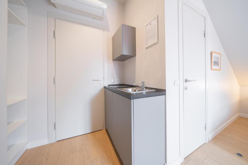Kuchyň nebo kuchyňský kout v ubytování Lollo Residence - Lollo Luxury