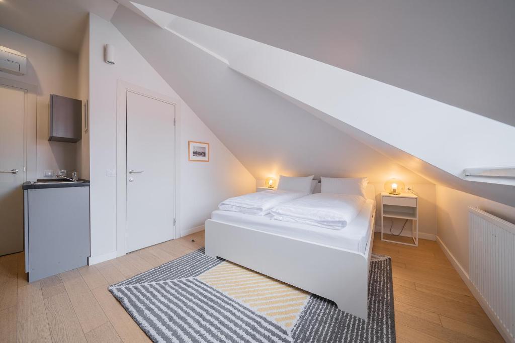 Postel nebo postele na pokoji v ubytování Lollo Residence - Lollo Luxury