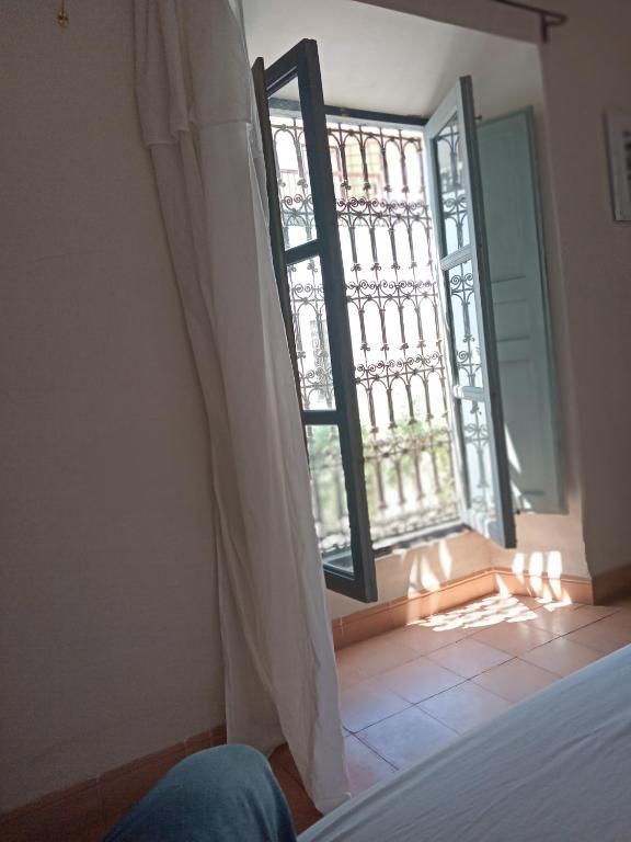 Postel nebo postele na pokoji v ubytování Riad le Jardin de Mina