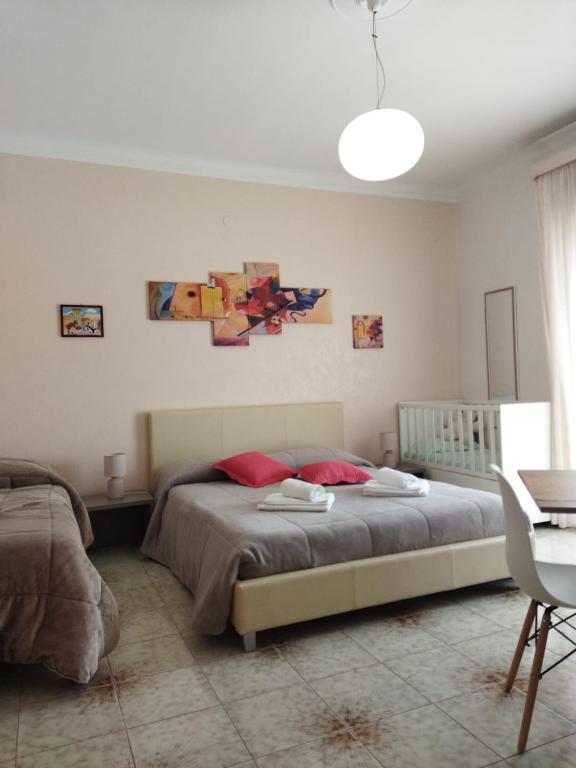 Postel nebo postele na pokoji v ubytování A Due Passi Dal Molino