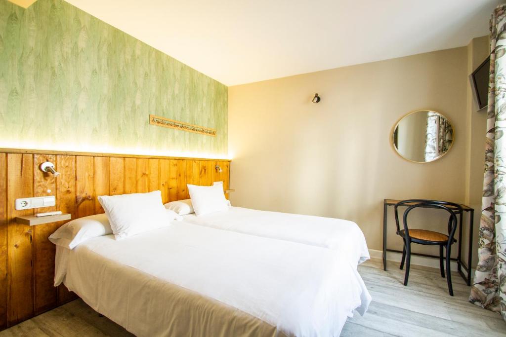 Posteľ alebo postele v izbe v ubytovaní Alameda Hostal Boutique