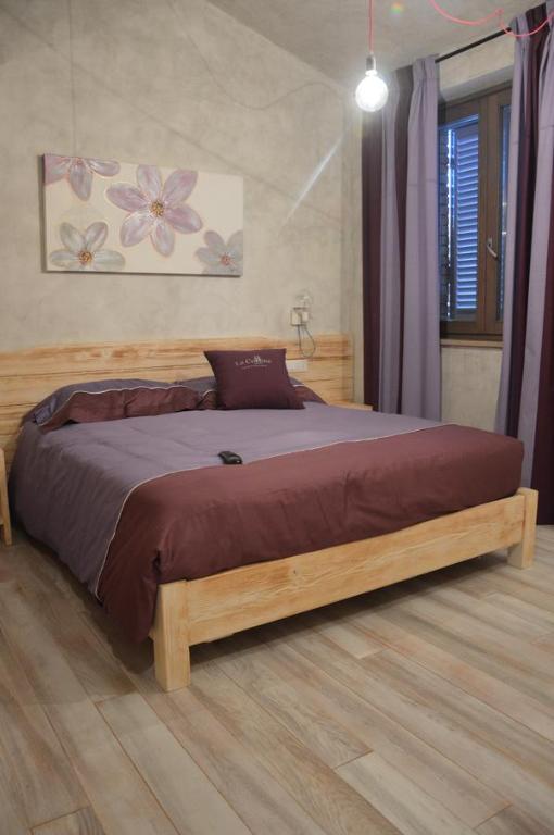 Een bed of bedden in een kamer bij Agriturismo La Collina