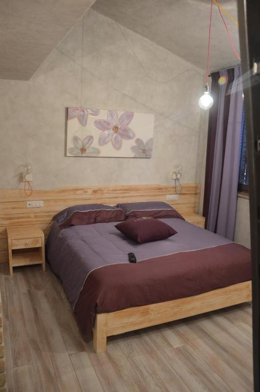 Een bed of bedden in een kamer bij Agriturismo La Collina