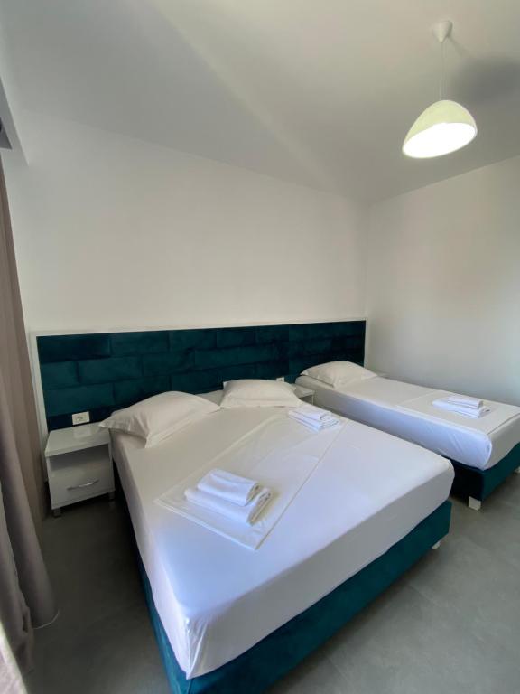 Postel nebo postele na pokoji v ubytování Eraldo's Rooms and Apartments