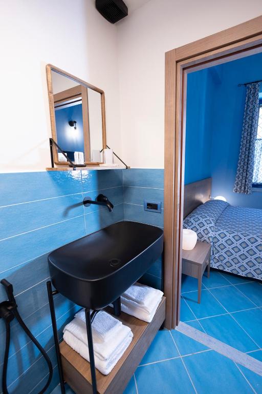 Postel nebo postele na pokoji v ubytování Casina Lambis