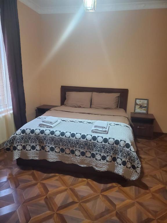 Postel nebo postele na pokoji v ubytování СУХУМИЯ