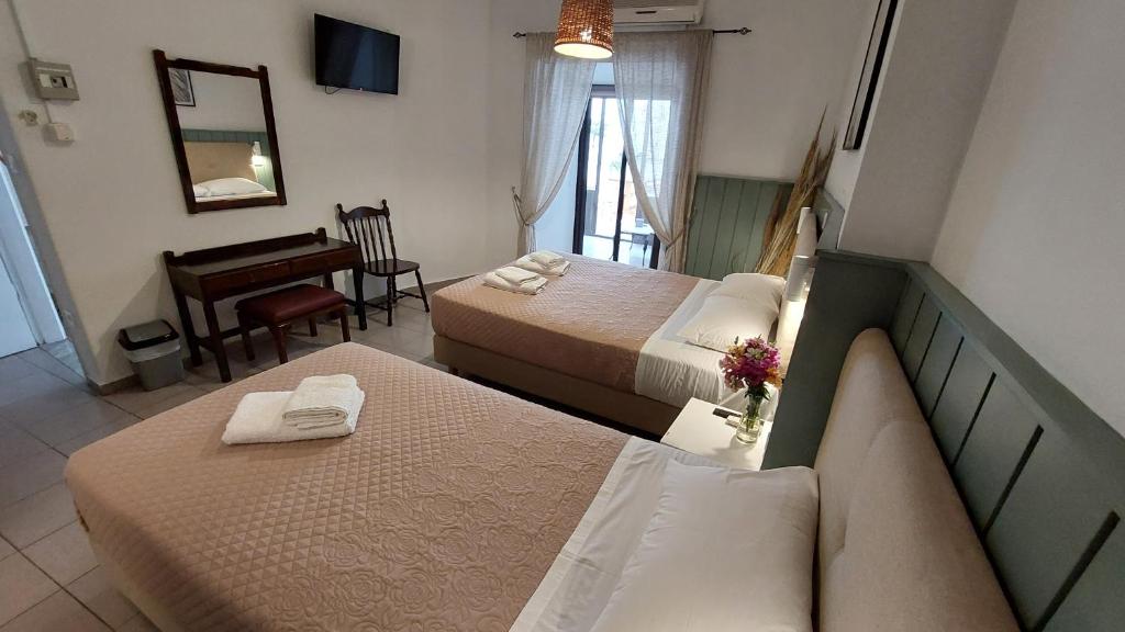 Posteľ alebo postele v izbe v ubytovaní OLD TOWN TALES apartments
