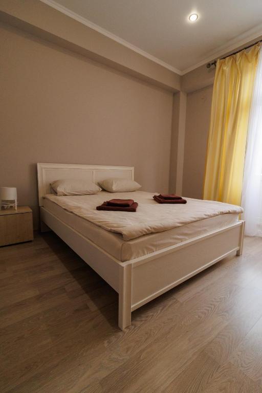 Postel nebo postele na pokoji v ubytování Apartments na Beregu