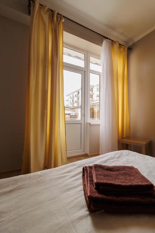 Postel nebo postele na pokoji v ubytování Apartments na Beregu