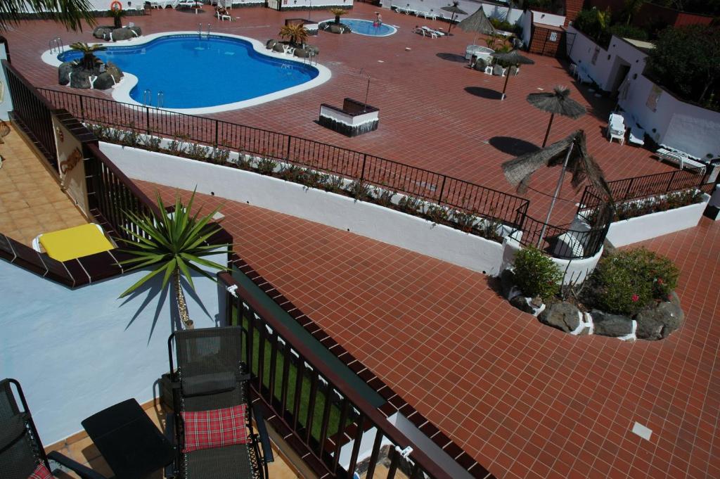 Bazén v ubytování Penthouse El Mirador Los Cristianos Tenerife - VV nebo v jeho okolí