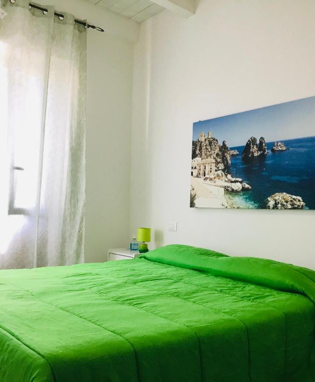 A bed or beds in a room at Camere Simona
