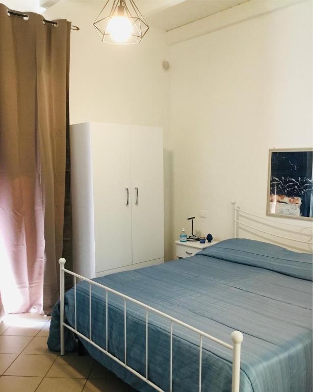 A bed or beds in a room at Camere Simona