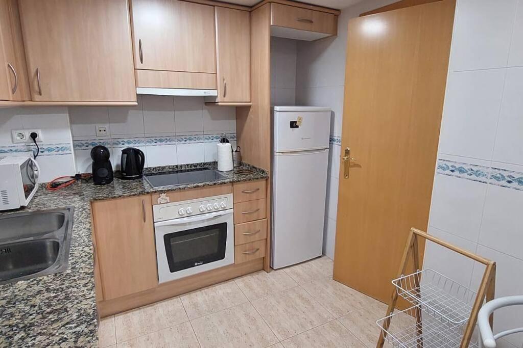 Kuchyň nebo kuchyňský kout v ubytování Apartamento Mediterráneo Salou!