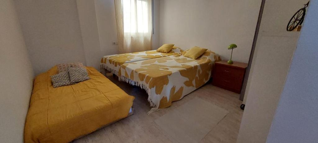 Postel nebo postele na pokoji v ubytování Apartamento Mediterráneo Salou!