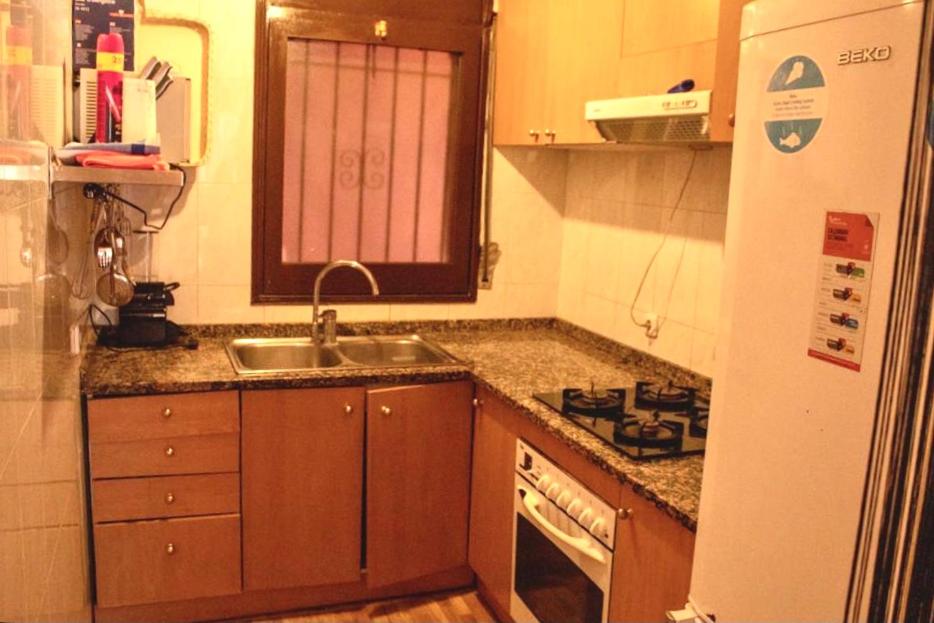 Kuchyňa alebo kuchynka v ubytovaní Apartamento duplex Begur(costa brava)
