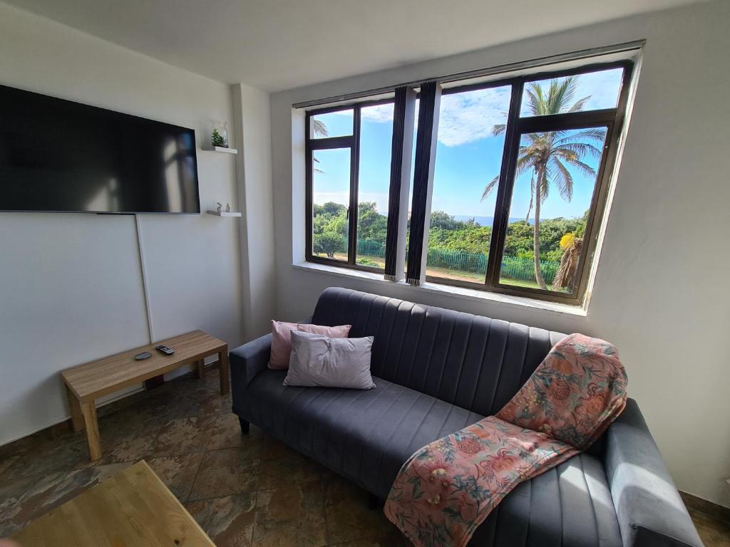 TV a/nebo společenská místnost v ubytování Capri Beach Holiday home