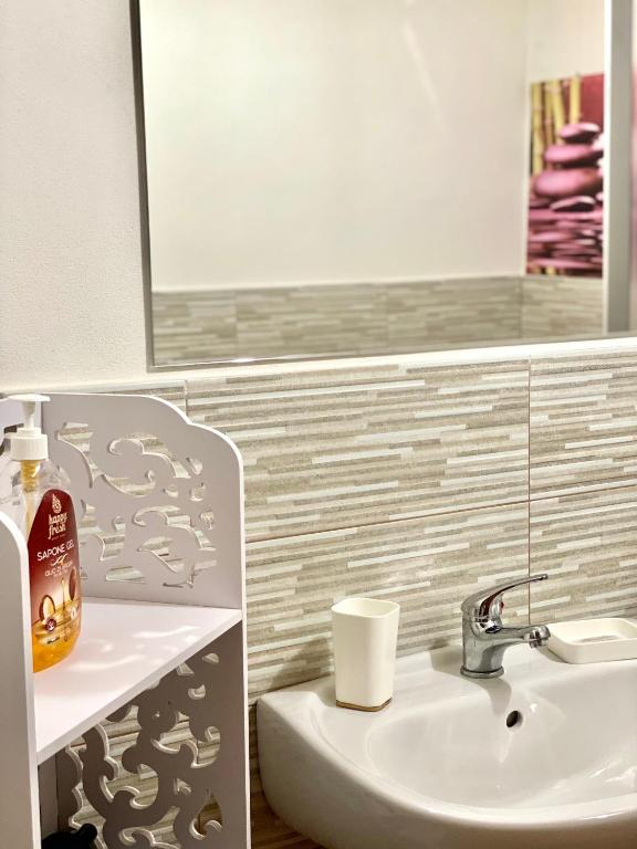 Kúpeľňa v ubytovaní La casa dei bouganville Lo stagnone