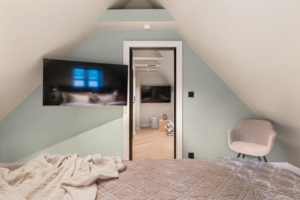 TV a/nebo společenská místnost v ubytování Bryggen Living