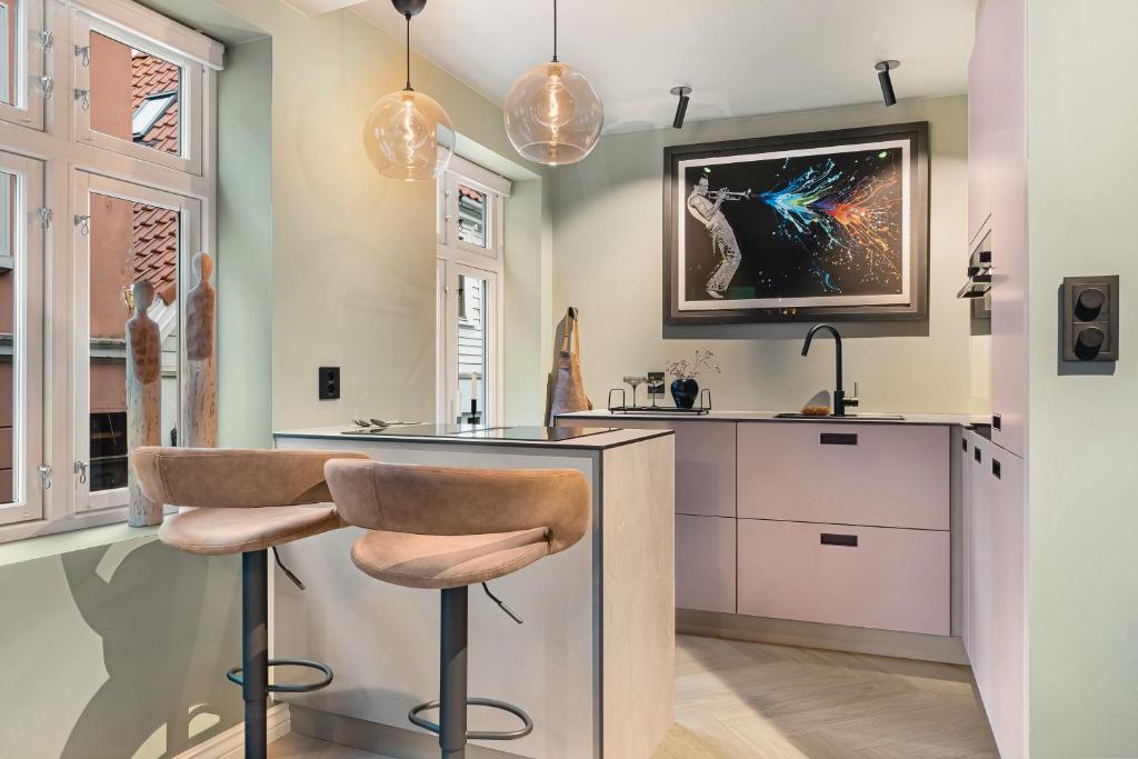 Kuchyň nebo kuchyňský kout v ubytování Bryggen Living