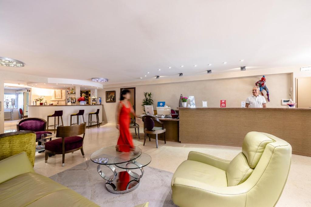 Posezení v ubytování Hôtel Les Trois Roses, Meylan Grenoble