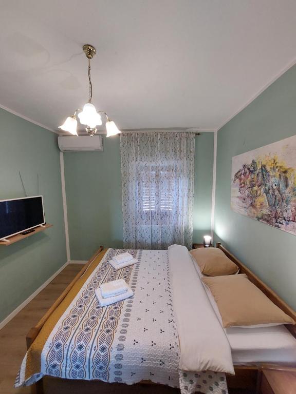 Posteľ alebo postele v izbe v ubytovaní Agrotourism Galic Krka