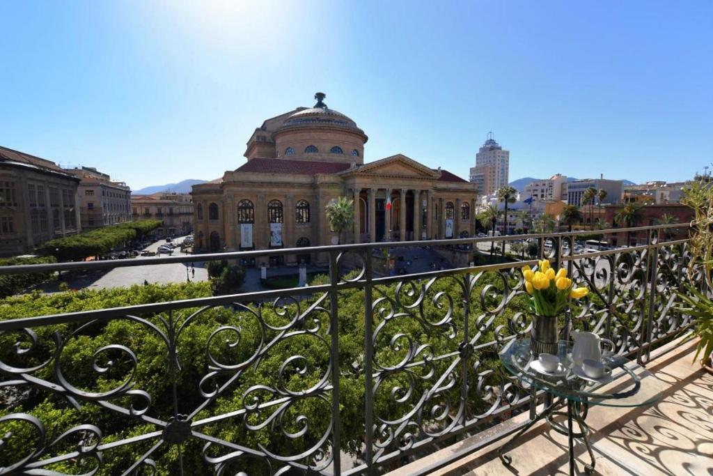 a balcony with a view of a building at Al Massimo Piacere in Palermo
