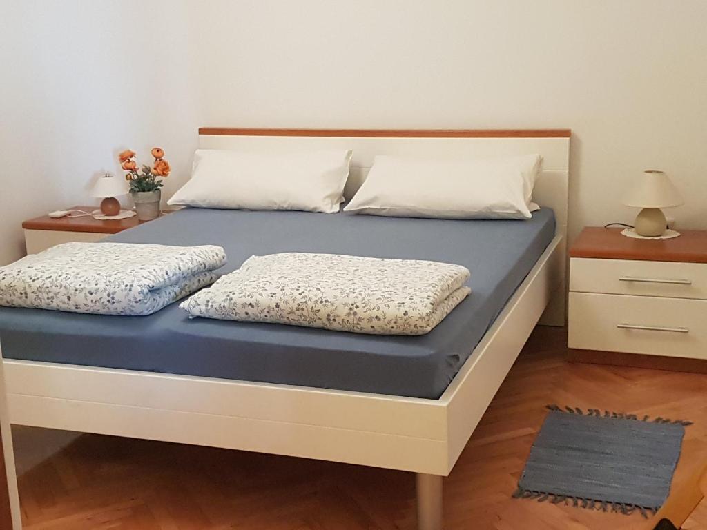 Łóżko lub łóżka w pokoju w obiekcie Casa Croatia