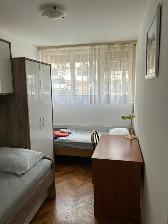 Posteľ alebo postele v izbe v ubytovaní City Apartment Sonya