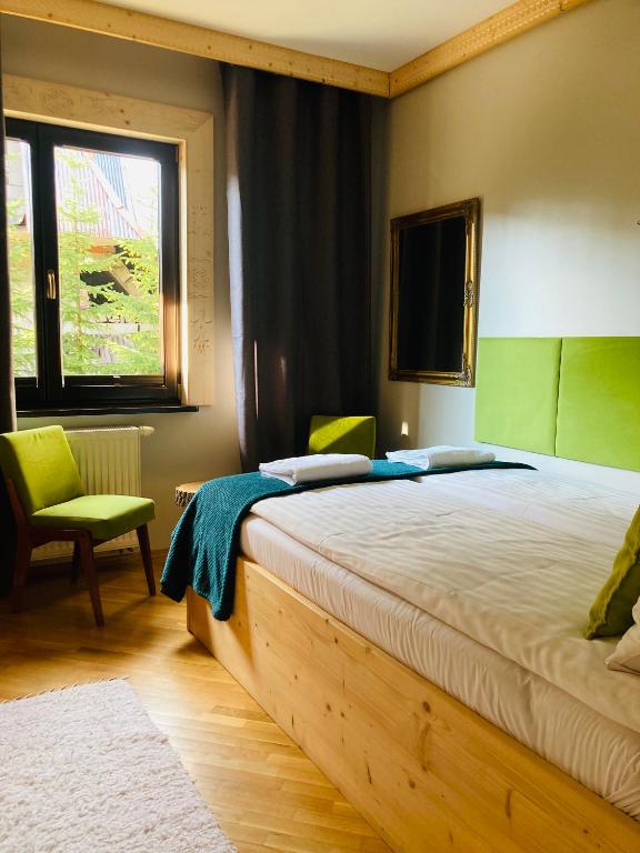 Posteľ alebo postele v izbe v ubytovaní Willa Mecenasówka