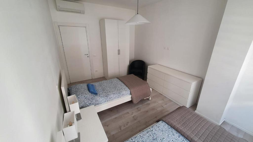 Postel nebo postele na pokoji v ubytování CarloAlbertoApartmentsrooms